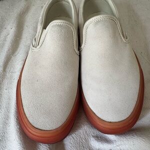 Vans White Slip-On Shoes with Red Soles